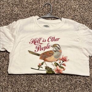 White Graphic Tee with Bird and Floral Design